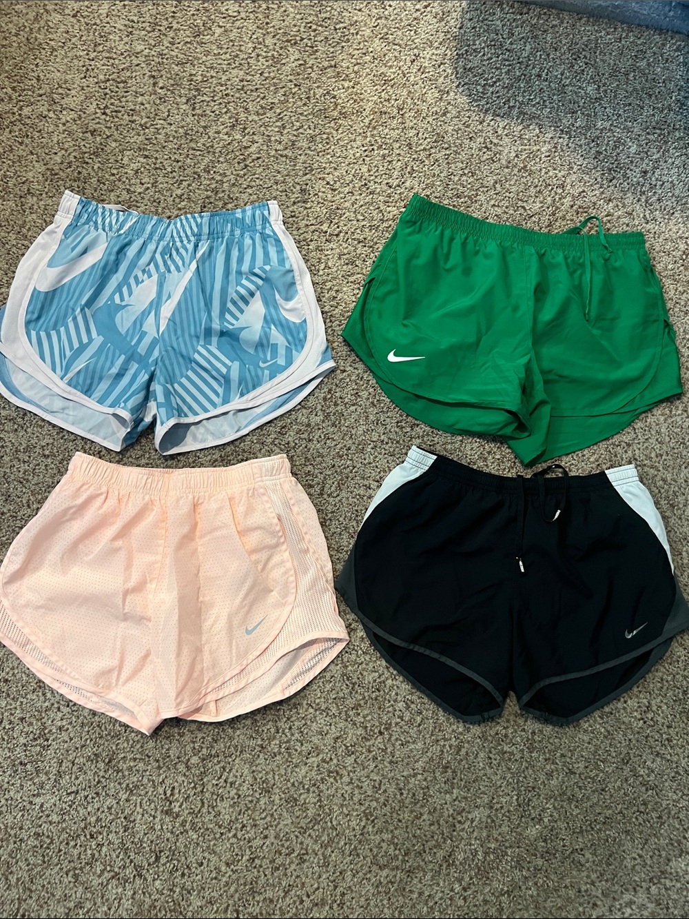 Nike Women's Small Four-Pack Athletic Shorts - Green, Black, Light Blue, Peach